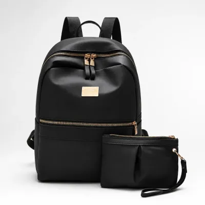 Elegantni crni ženski ruksak s gratis mini torbicom